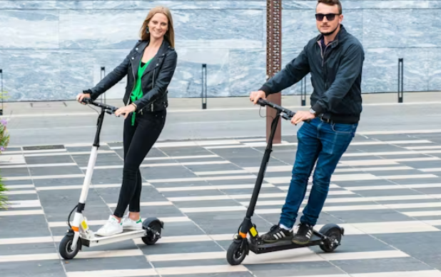 technician working on scooter